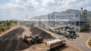 A large-scale industrial facility of a pellets manufacturer in India featuring conveyor belts, piles of processed pellets, and a delivery truck, set against a backdrop of hills and a clear sky.